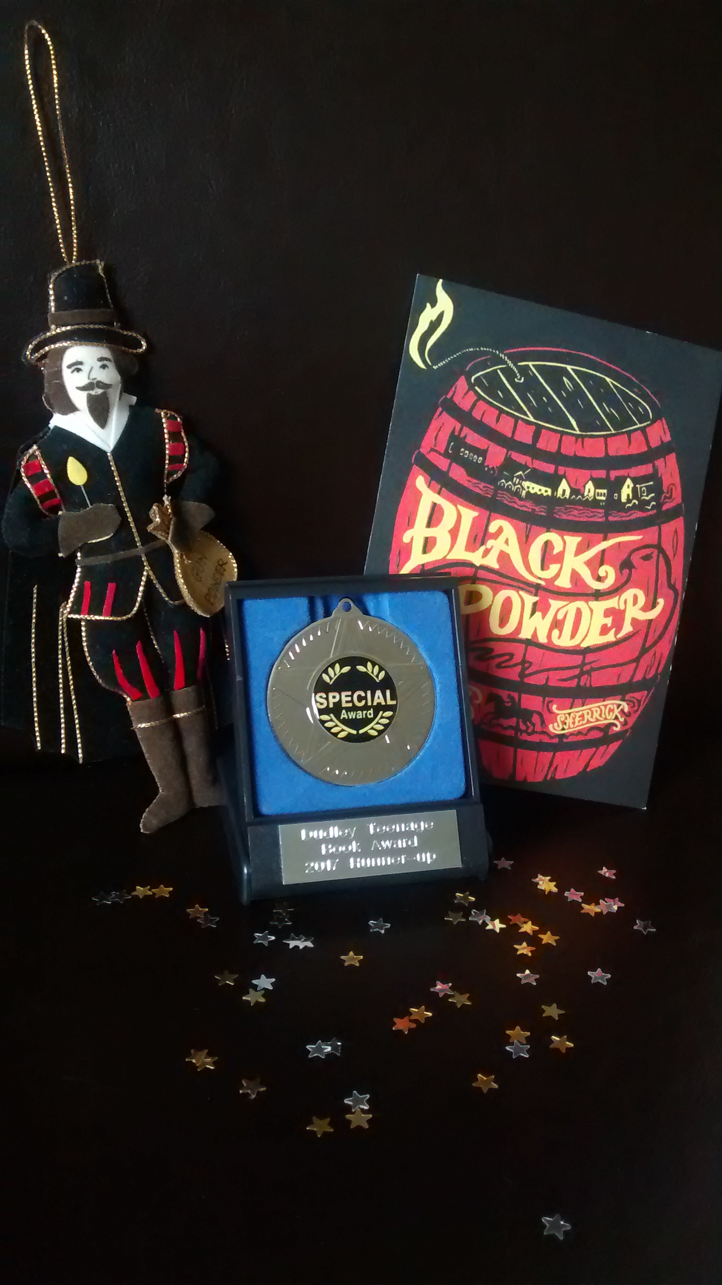 Guido celebrating his Dudley Teen Book Awards medal